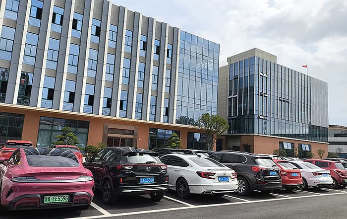 Glass-fronted buildings at TorqueBank's expanded manufacturing site in Hangzhou, China