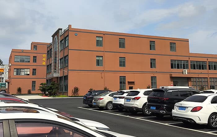 Repainted orange building at TorqueBank's manufacturing site in Hangzhou, China
